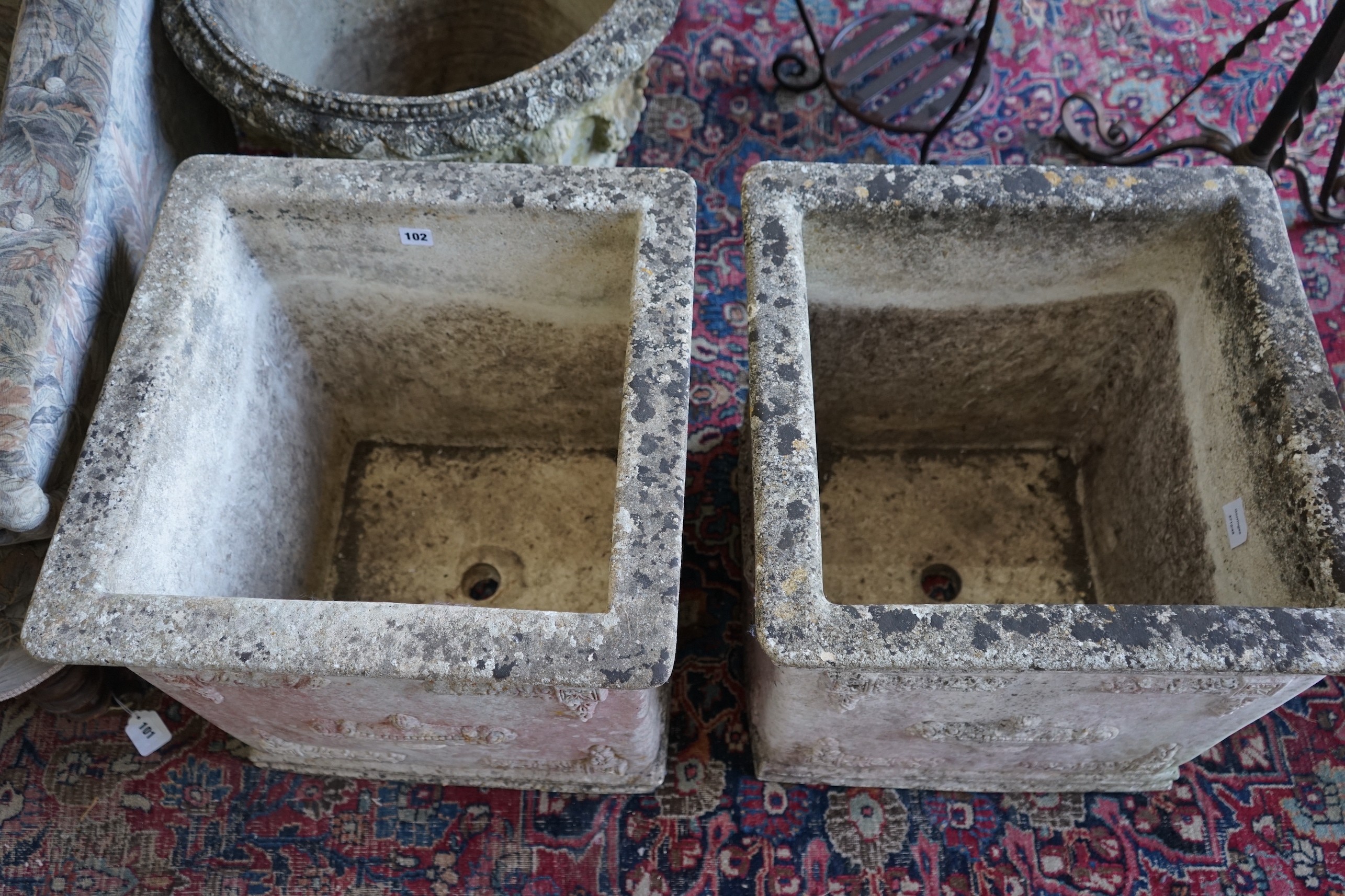 A pair of square reconstituted stone garden planters, width 50cm, height 49cm